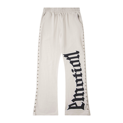 Mixed‑Emotion Rivet‑Trim Gothic Logo Flare Sweatpants